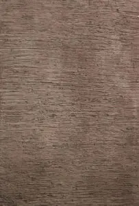 Die grob strukturierte Wand zeigt eine elegante Wandgestaltung mit Kalkputz von Einhorn Werke. Rezept: STUCCORINO 0,5, Farbton 1807 + 9010 + Goldglimmer mittel