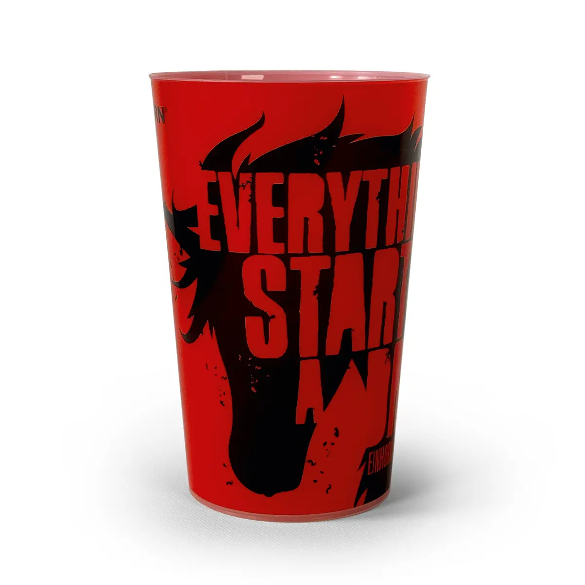 Ein roter Becher mit schwarzem Einhornmotiv und dem Schriftzug "Everything Starts" steht im Mittelpunkt.
