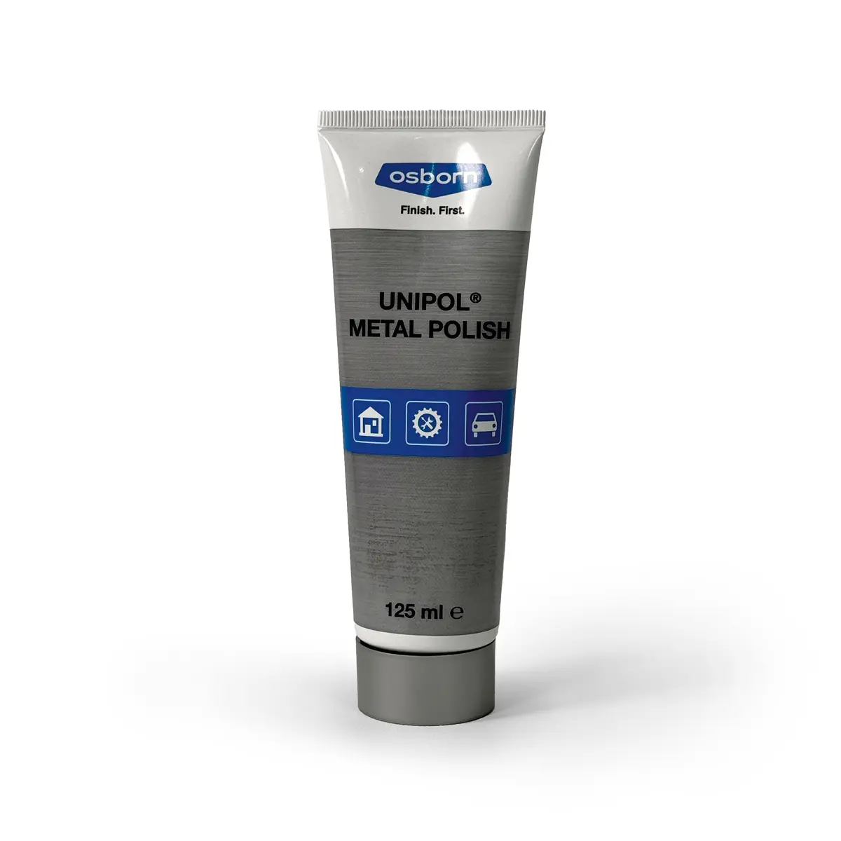 Eine Tube Unipol Metallpolitur steht aufrecht, ideal für glänzende Oberflächen und kreative Wandgestaltung.