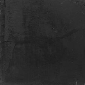 Eine elegante, schwarze Wand mit Stuccorino-Kalkputz verleiht dem Raum von Einhorn Werke eine stilvolle Wandgestaltung.