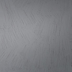 Die graue Wand zeigt eine kreative Struktur aus Streichputz, ideal für moderne Wandgestaltung im Wohnzimmer.