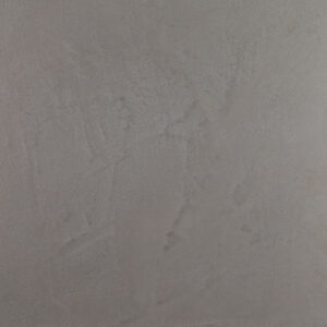 Eine stilvolle Wand zeigt die elegante Struktur des Marmorputzes, ideal für kreative Wandgestaltung im Wohnzimmer.
