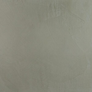 Die sandfarbene Wand zeigt eine glatte Oberfläche aus Marmorputz, ideal für stilvolle Wandgestaltung im Wohnzimmer.