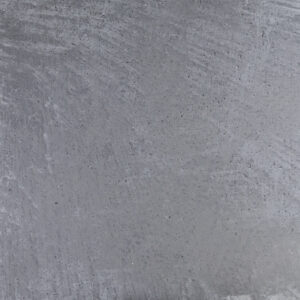Eine stilvolle graue Wand zeigt die edle Textur von MARMOREA-Nero-118, ideal für kreative Wandgestaltung im Wohnzimmer.