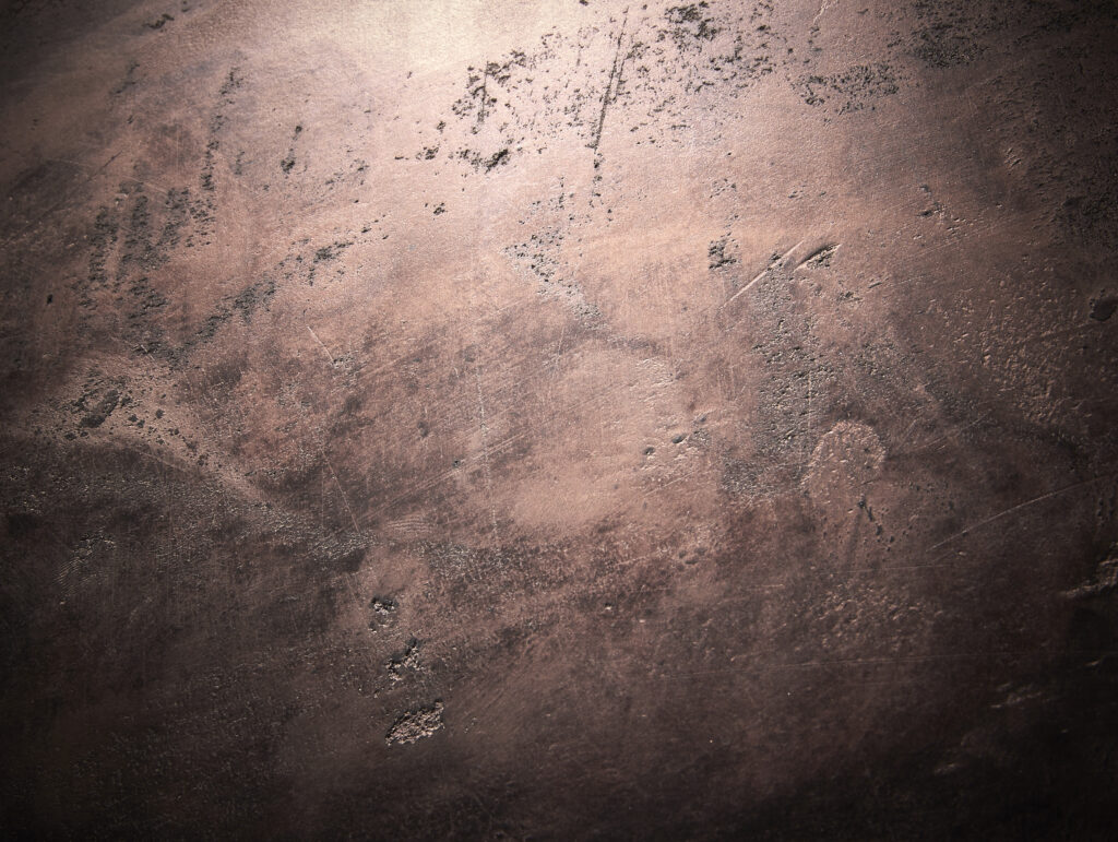 Die Wand zeigt eine elegante Textur mit Oberflaeche-STUCCORINO-Effect in Rose´gold, ideal für kreative Wandgestaltung.