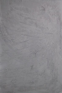 Die Wand zeigt eine elegante Streichputz-Oberfläche in Goldglimmer, ideal für kreative Wandgestaltung im Wohnzimmer.