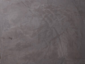 Die Oberfläche zeigt eine stilvolle Wandgestaltung mit Oberflaeche-STUCCORINO-®-Marrakesh-0907 Kalkputz von Einhornwerke.