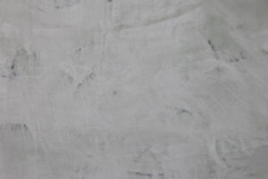 Eine stilvolle Wandgestaltung mit VENEZIANO-Dolce Streichputz zeigt elegante Texturen für moderne Wohnzimmer.