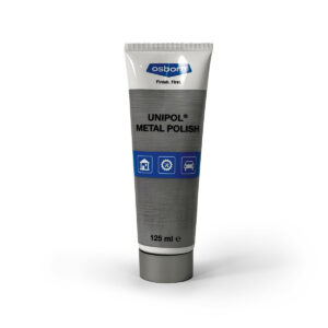 Eine Tube Unipol Metallpolitur steht aufrecht, ideal für glänzende Oberflächen und kreative Wandgestaltung.