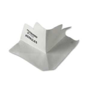 Ein weißes, gefaltetes Papierobjekt mit dem Aufdruck "Einhorn Werke HERCULES" liegt auf einer hellen Oberfläche.