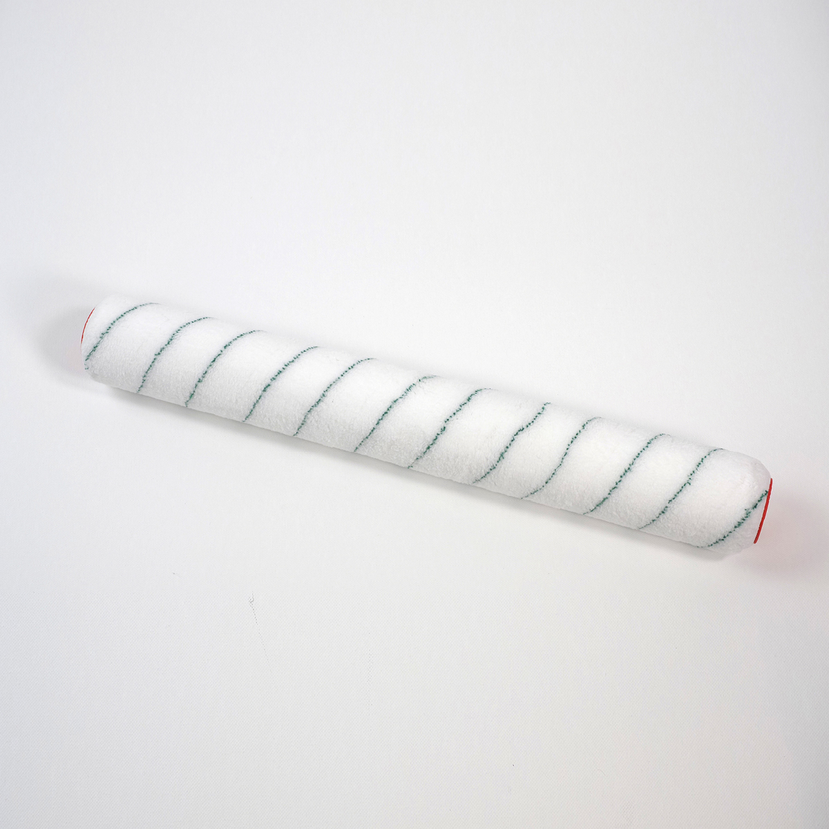 Die Lackrolle Aquatop 50cm von Einhornwerke liegt auf weißem Untergrund, ideal zur Wandgestaltung im Wohnzimmer.